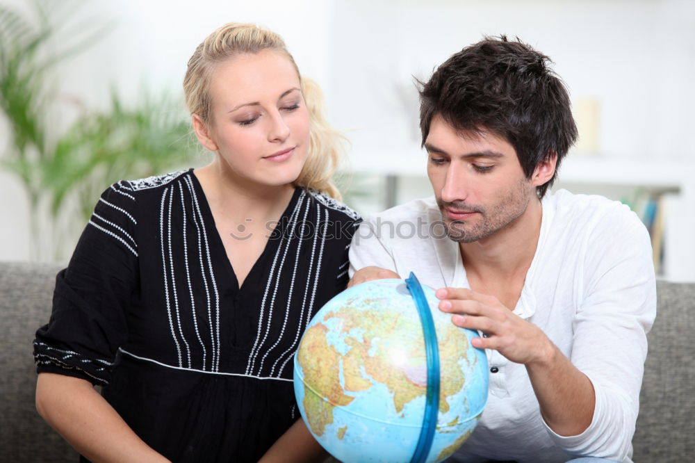 Image, Stock Photo Teenagers sitting by the map in classroom