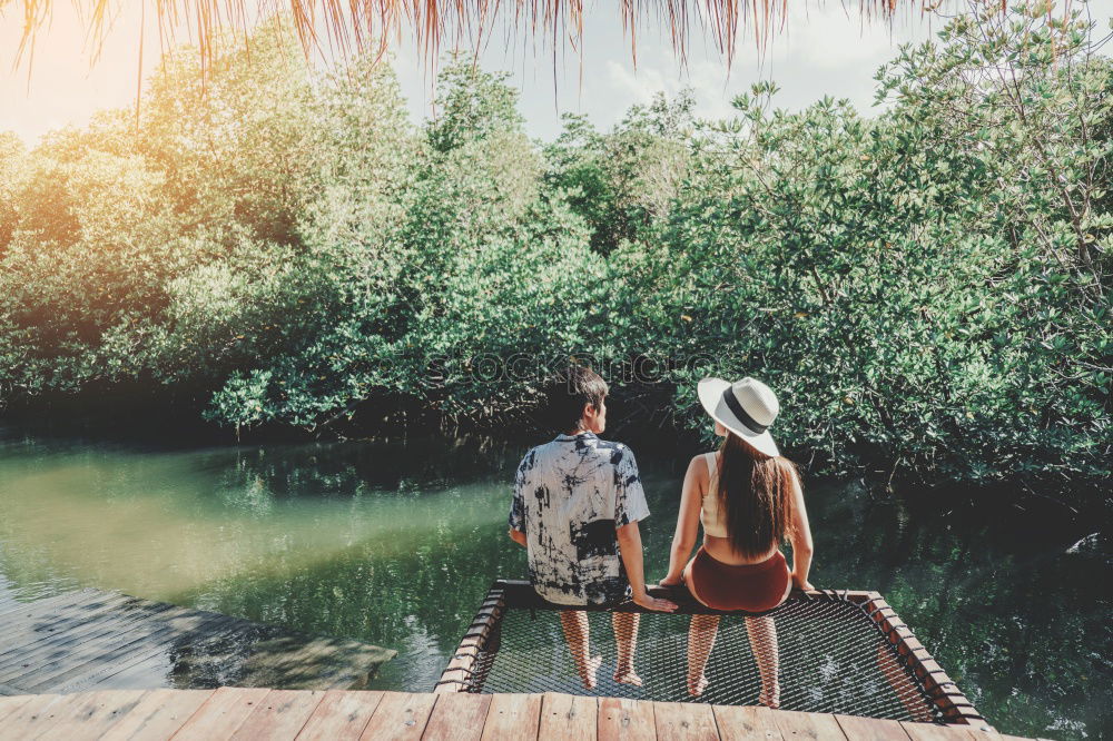 Similar – Image, Stock Photo Couple embracing on pier