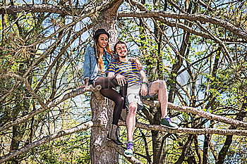 Similar – Image, Stock Photo Two teenagers climbing in a tree