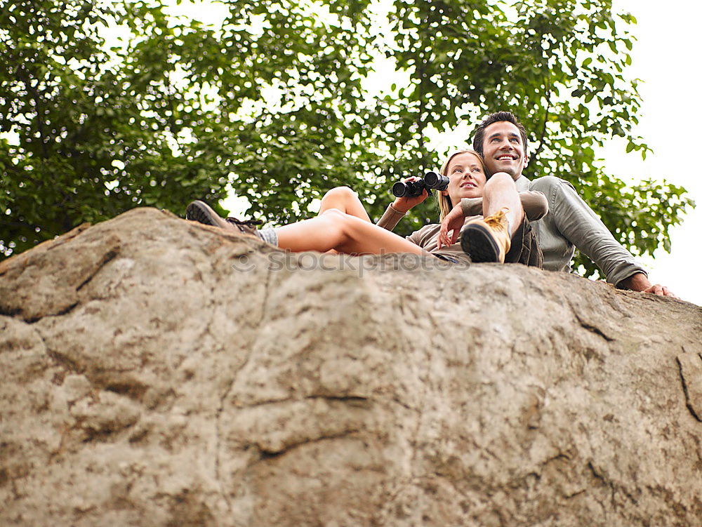 Similar – Image, Stock Photo Two teenagers climbing in a tree