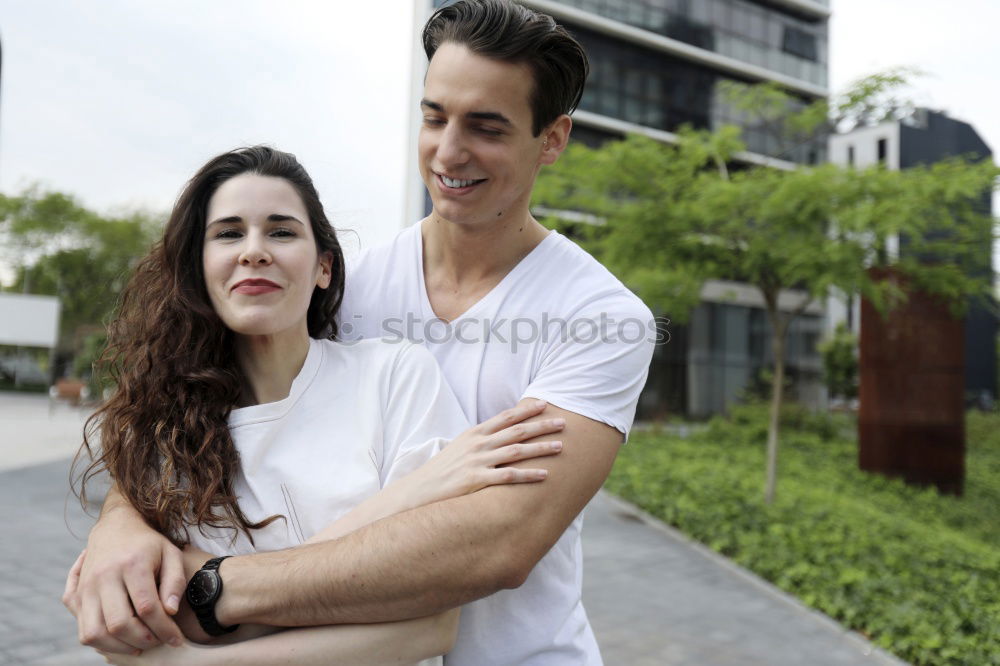 Similar – Young beautiful couple posing wearing jeans and t-shirt