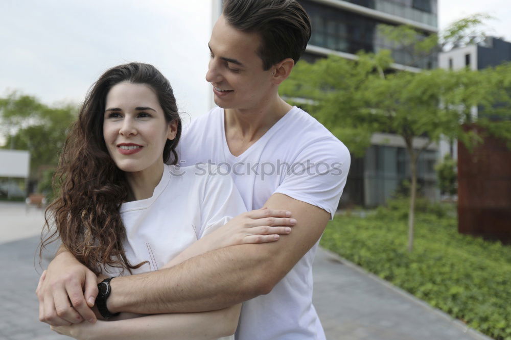 Similar – Young beautiful couple posing wearing jeans and t-shirt