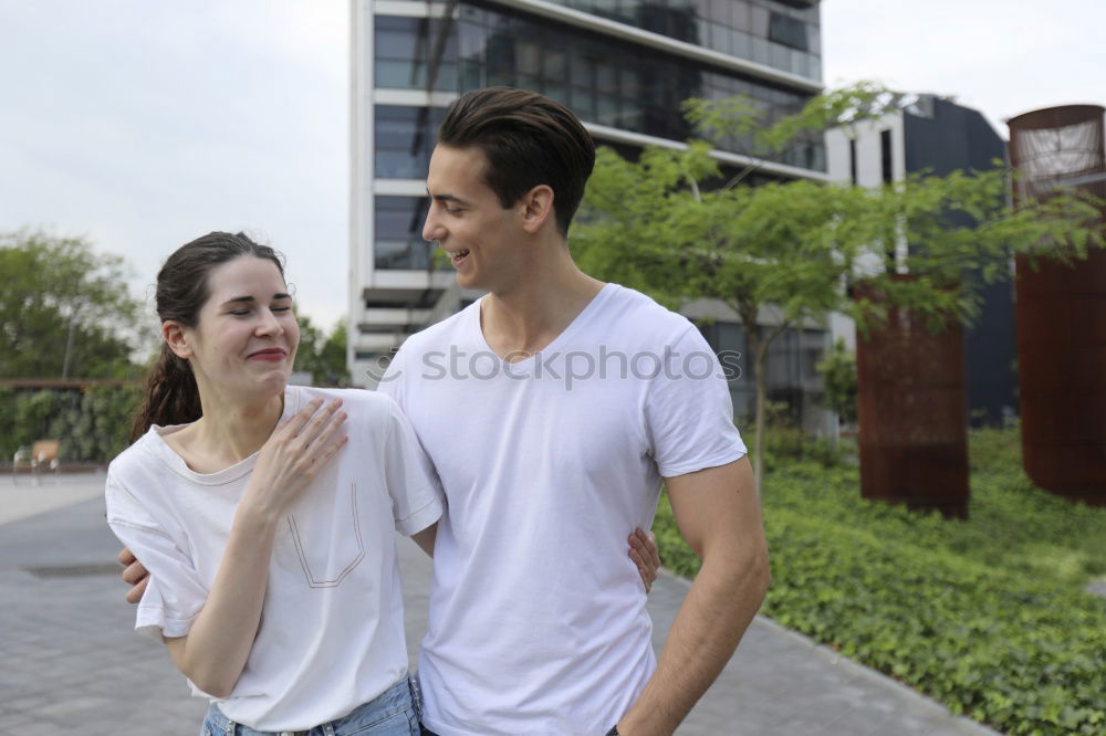 Similar – Young beautiful couple posing wearing jeans and t-shirt