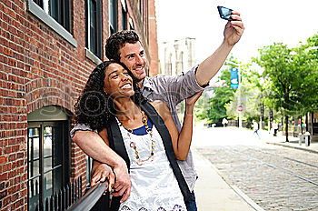 Similar – Image, Stock Photo Two cheerful friends taking photos of themselves on smart phone