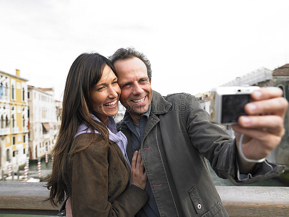 Image, Stock Photo Cheerful friends taking photos of themselves on smart phone