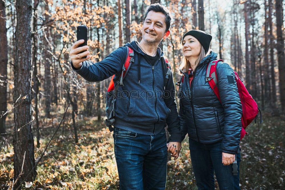 Image, Stock Photo Couple pausing while doing trekking