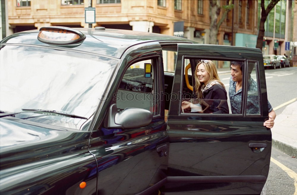 Similar – Smoking man looking out of taxi