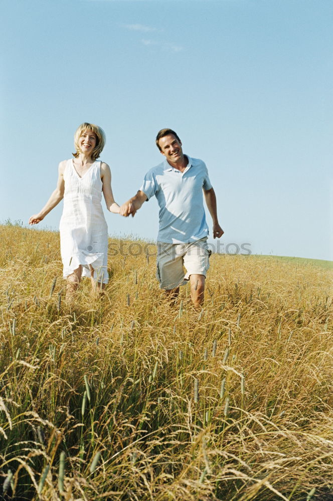 Similar – Image, Stock Photo Grandfather showing his hat to grandchild outdoors