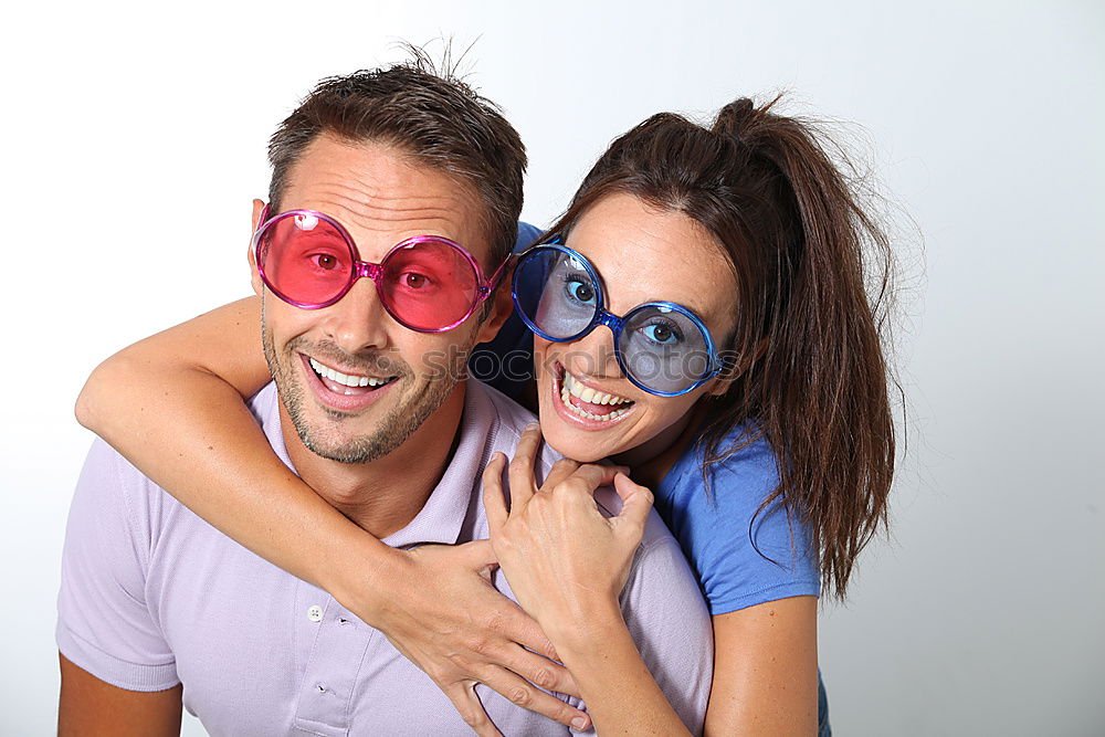 Similar – Image, Stock Photo funny grandparents with big star glasses on brick background