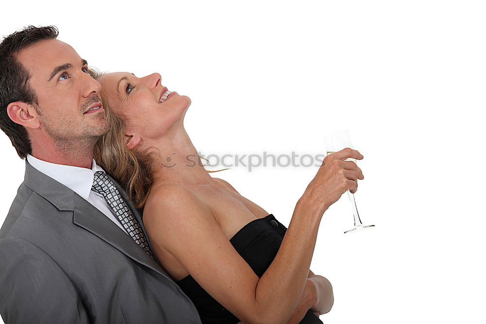 Similar – Image, Stock Photo Bride and groom enjoy a quiet moment together and a drink of white wine at their wedding reception