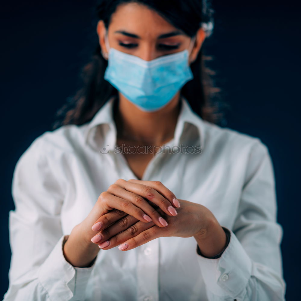 Similar – close up of Photo of a woman wearing protective mask against infectious diseases, coronavirus, covid-19 and flu outdoors. copy space. Coronavirus outbreak in Europe. Flu epidemic spread prevention