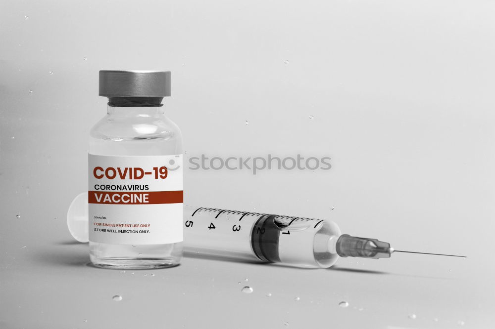 Similar – Concept fight against virus covid-19 corona virus, doctor or scientist in laboratory holding a syringe with liquid vaccines. Concept:diseases,medical care,science