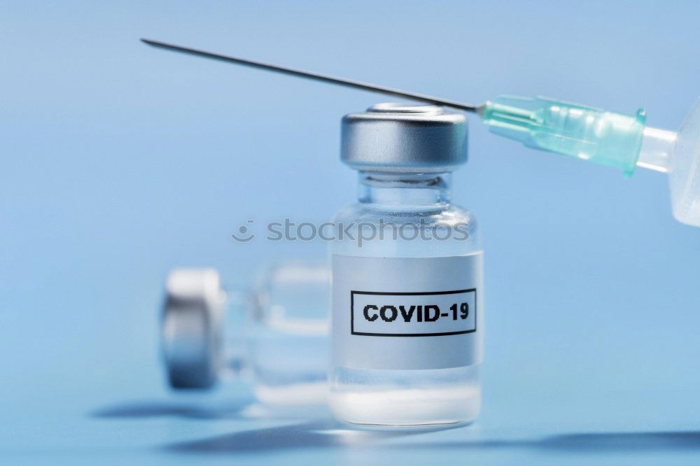 Similar – Concept fight against virus covid-19 corona virus, doctor or scientist in laboratory holding a syringe with liquid vaccines. Concept:diseases,medical care,science