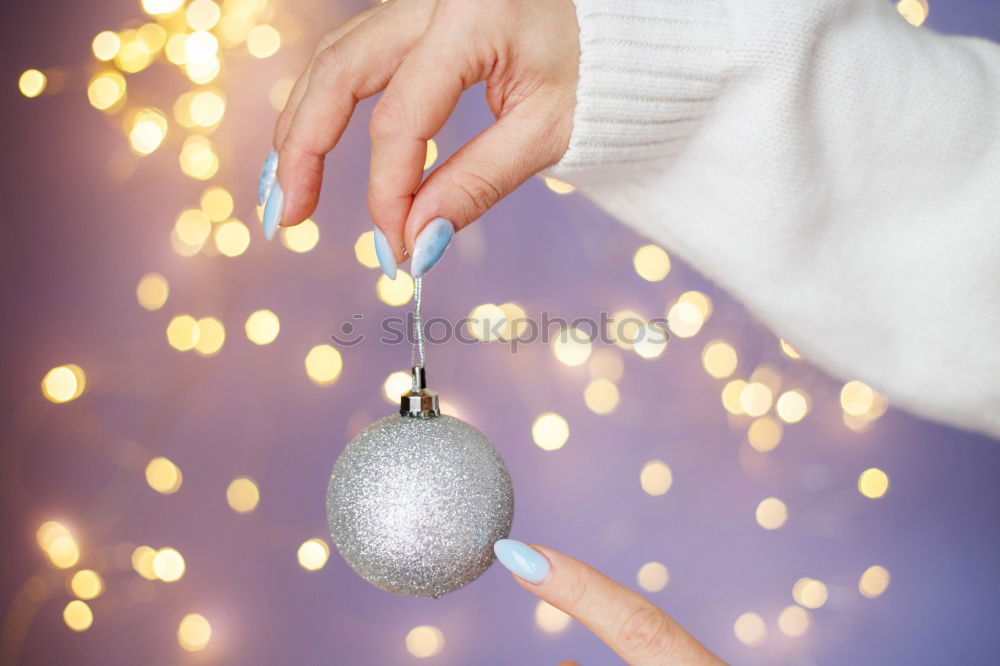 Similar – Young man holding a christmas gift