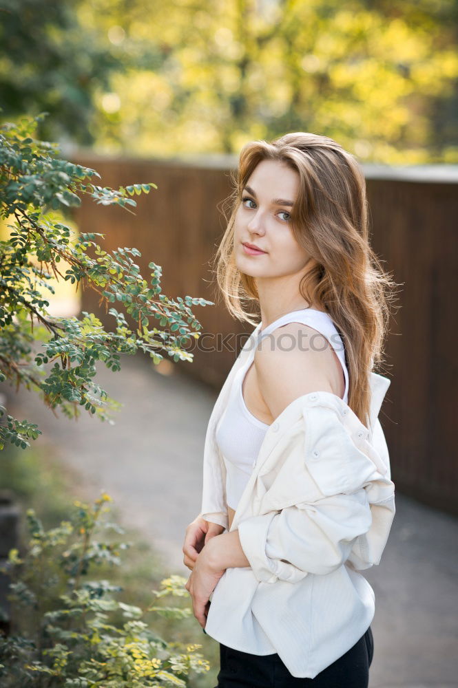 Similar – Image, Stock Photo Beautiful young woman with hot eyes in front of a brick wall