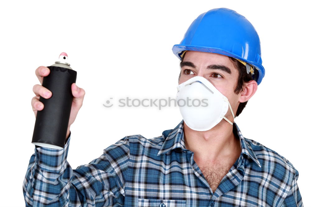 Similar – Workman in protective mask and glasses standing on street