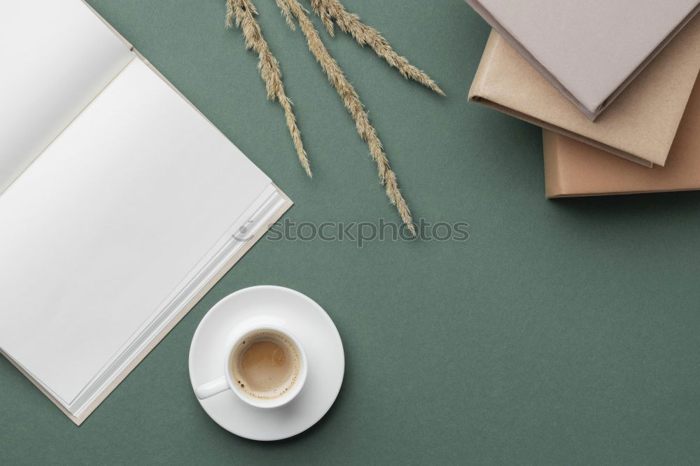 Similar – Green slip of paper with pen, a cup of coffee and a potted plant