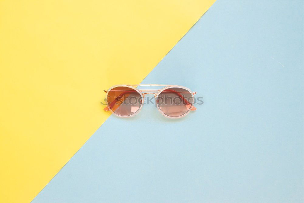 Image, Stock Photo Top view of green and yellow sunglasses