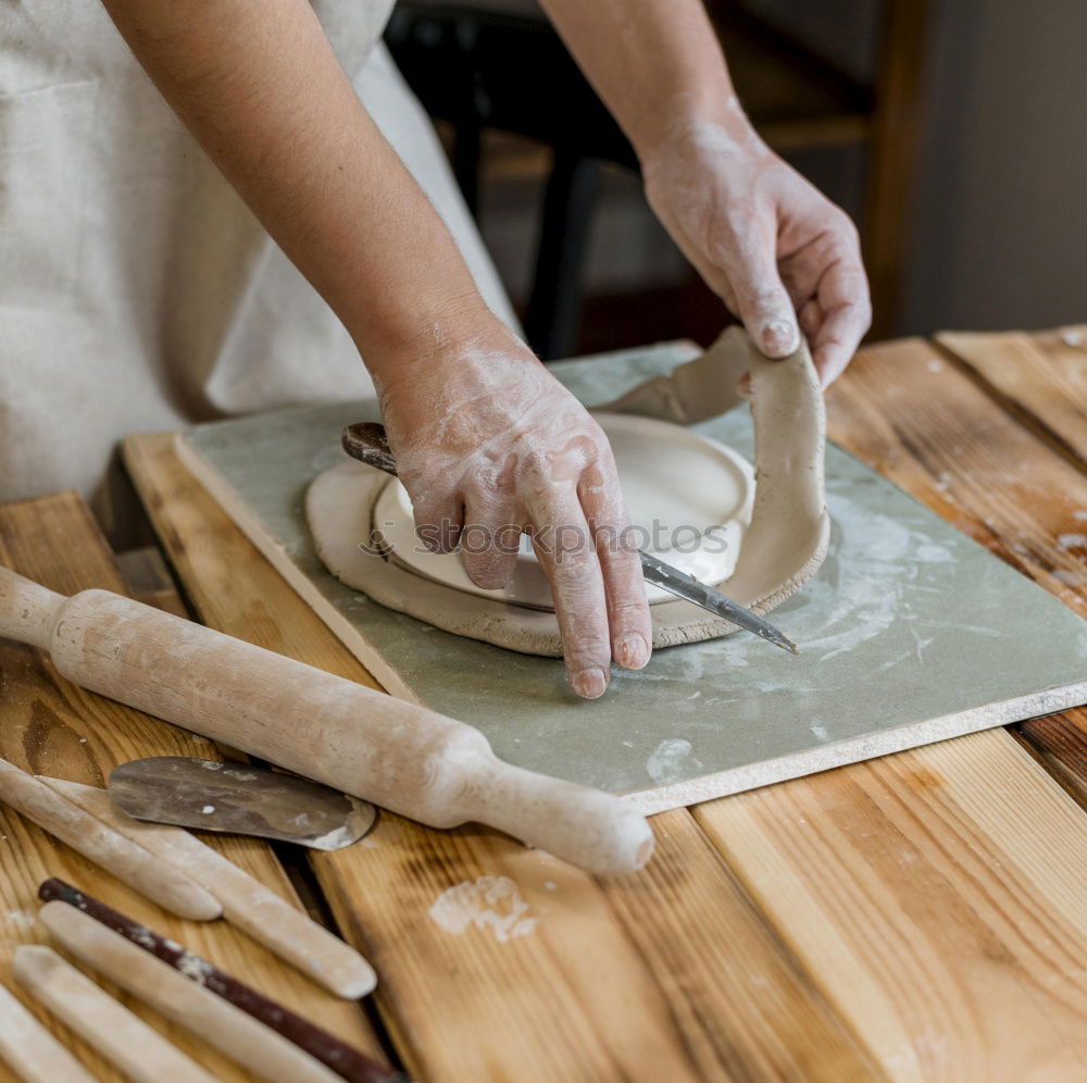 Similar – Woman chef hands rolling up japanese sushi