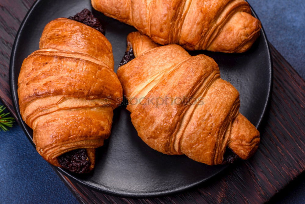 Similar – fresh bread and baked goods on wooden