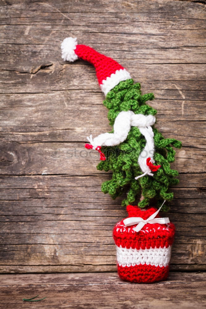 Similar – Christmas decorations over a swing in a park