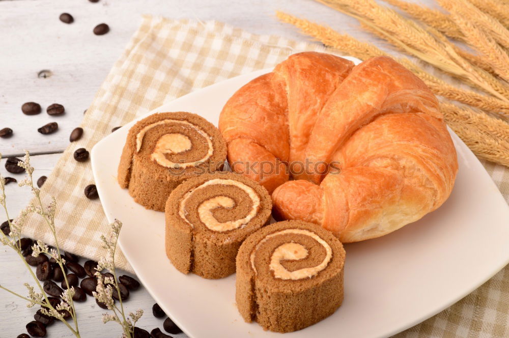 Similar – fresh bread and baked goods on wooden