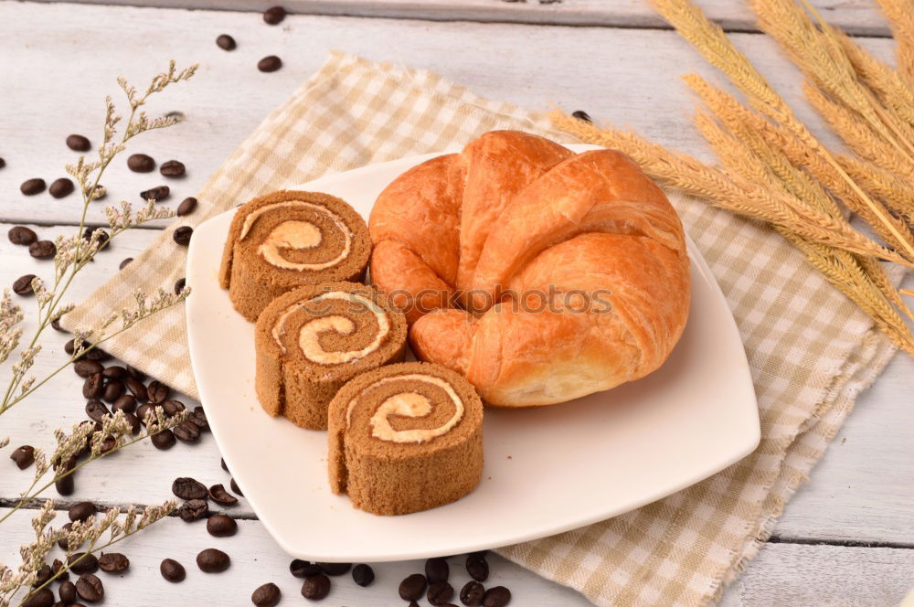 fresh bread and baked goods on wooden