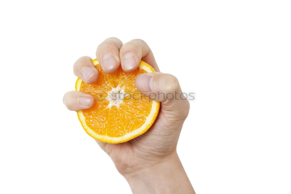 Similar – hand holding an orange in original shape