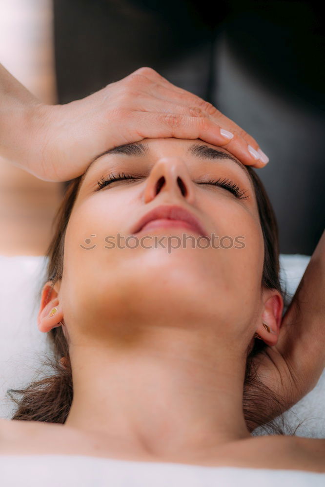 Similar – Image, Stock Photo Woman receiving massage on shoulders in clinical center