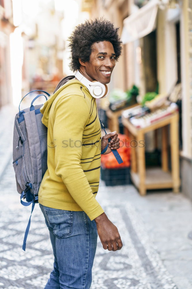 Similar – Image, Stock Photo Smiling black man with smartphone in his hand