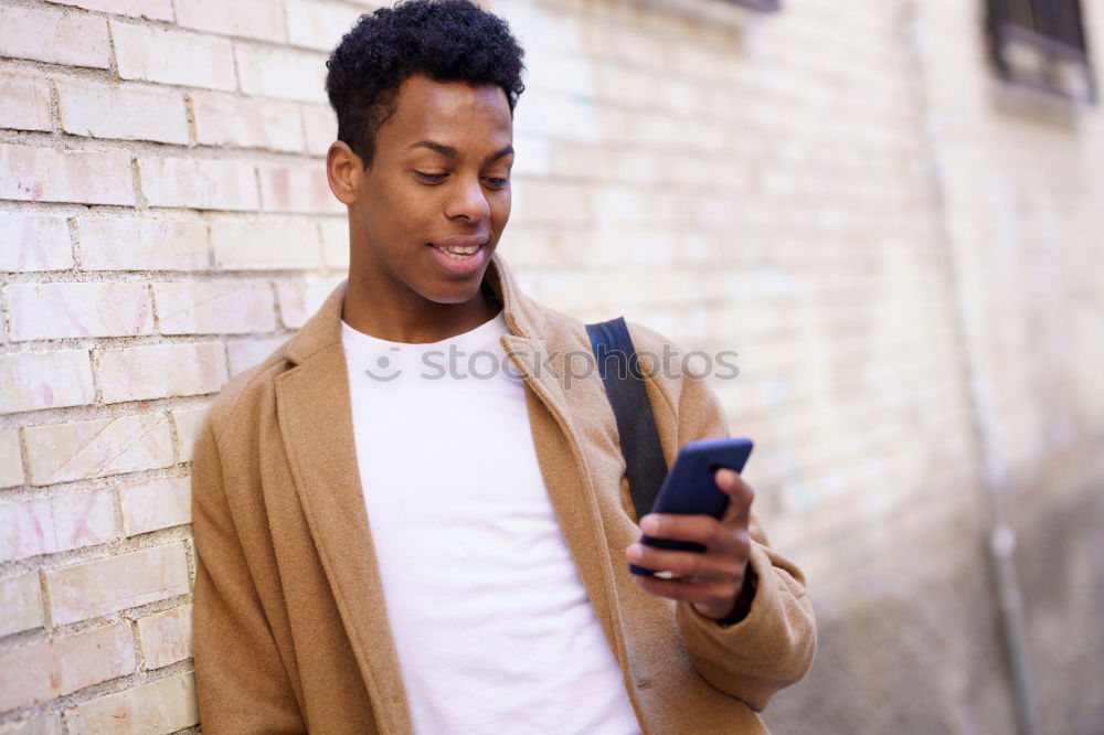 Similar – Image, Stock Photo American man using mobile in the street.