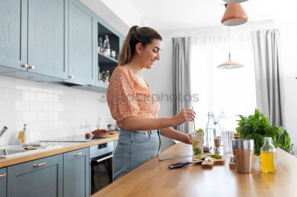 Similar – Woman preparing sandwiches in kitchen