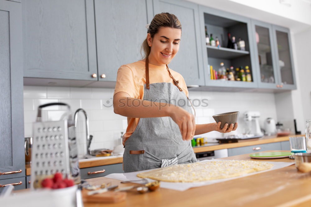 Image, Stock Photo woman chef preparing a recipe