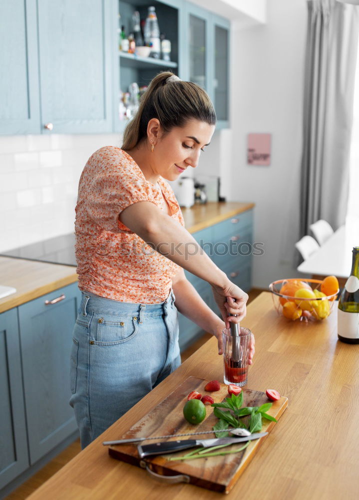 Similar – Woman preparing sandwiches in kitchen