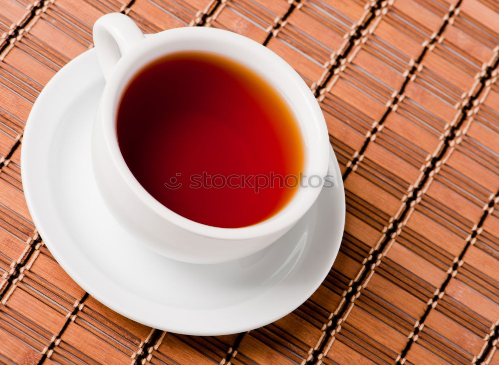 Similar – Image, Stock Photo Two woman hands holding empty finished cup of black tea