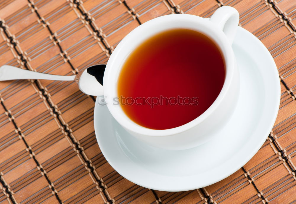 Similar – Image, Stock Photo Two woman hands holding empty finished cup of black tea