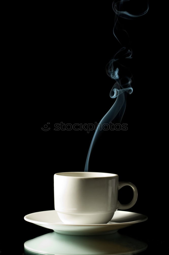 Similar – Poring hot coffee in an enamel cup