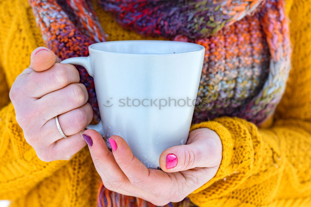 Similar – Happy young woman holding a cup of tea or coffee