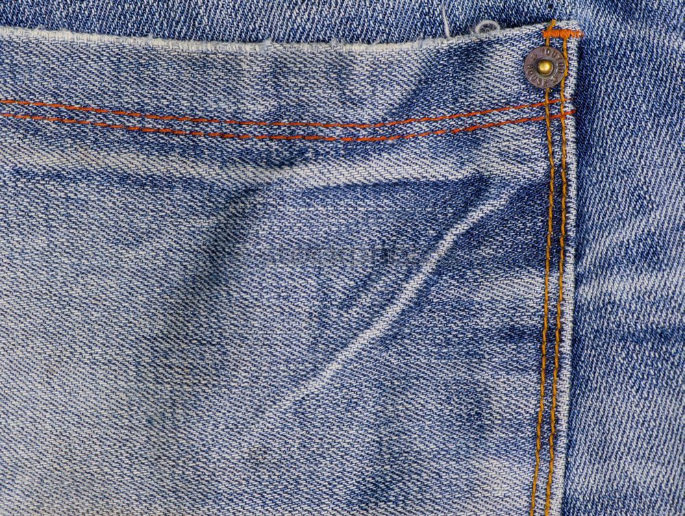 Similar – Textur-Tasche einer blauen, zerknitterten Jeans Makro-Nahaufnahme