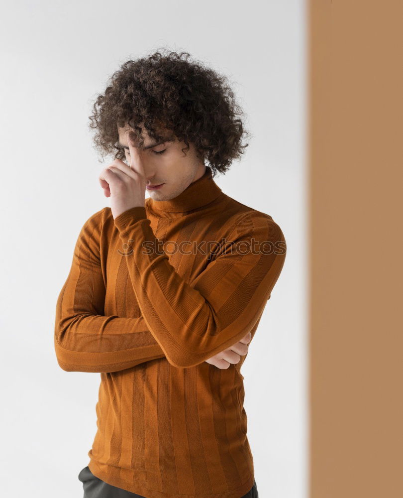 Similar – Image, Stock Photo Portrait of a young thoughtful mixed race man sitting in the sofa