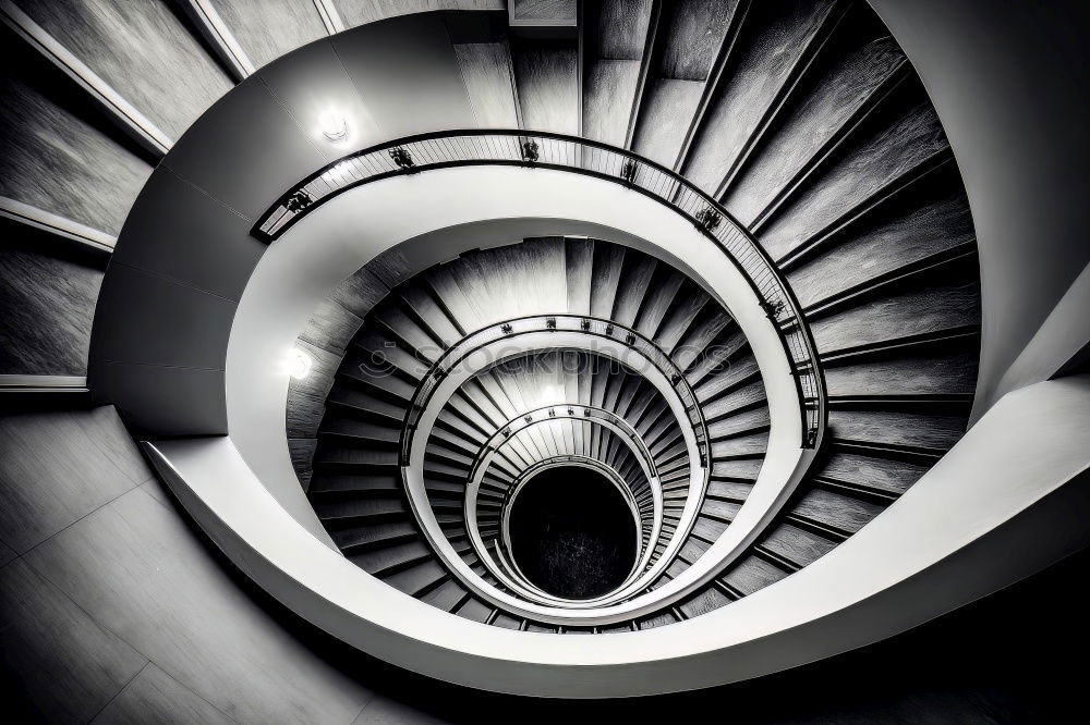 Similar – Top view of a spiral staircase in an old building