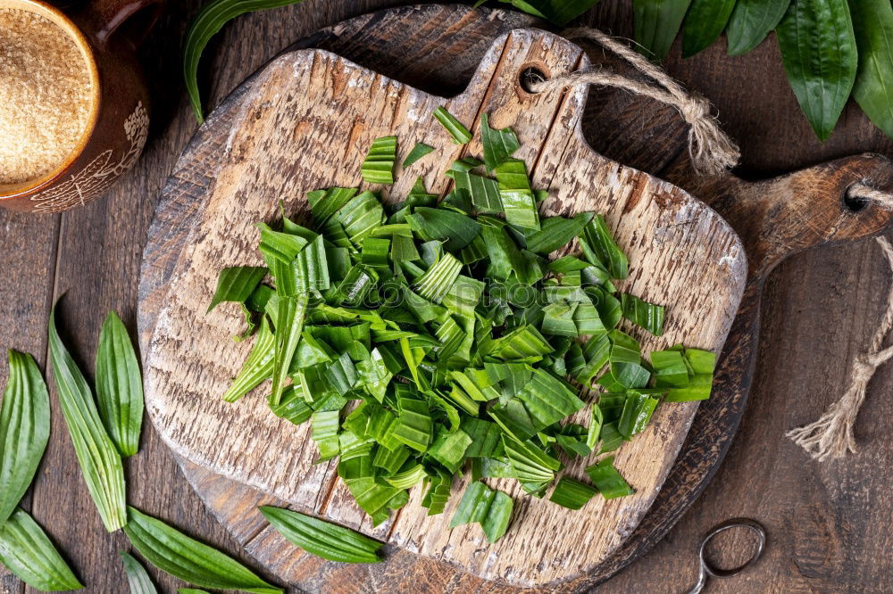 Similar – Green kale pesto in glass on dark rustic kitchen table background with ingredients, top view. Kale preparation. Healthy detox vegetables . Clean eating and dieting concept.