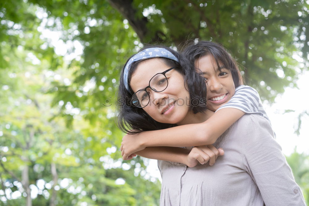 Similar – Image, Stock Photo Girls hugging at lake