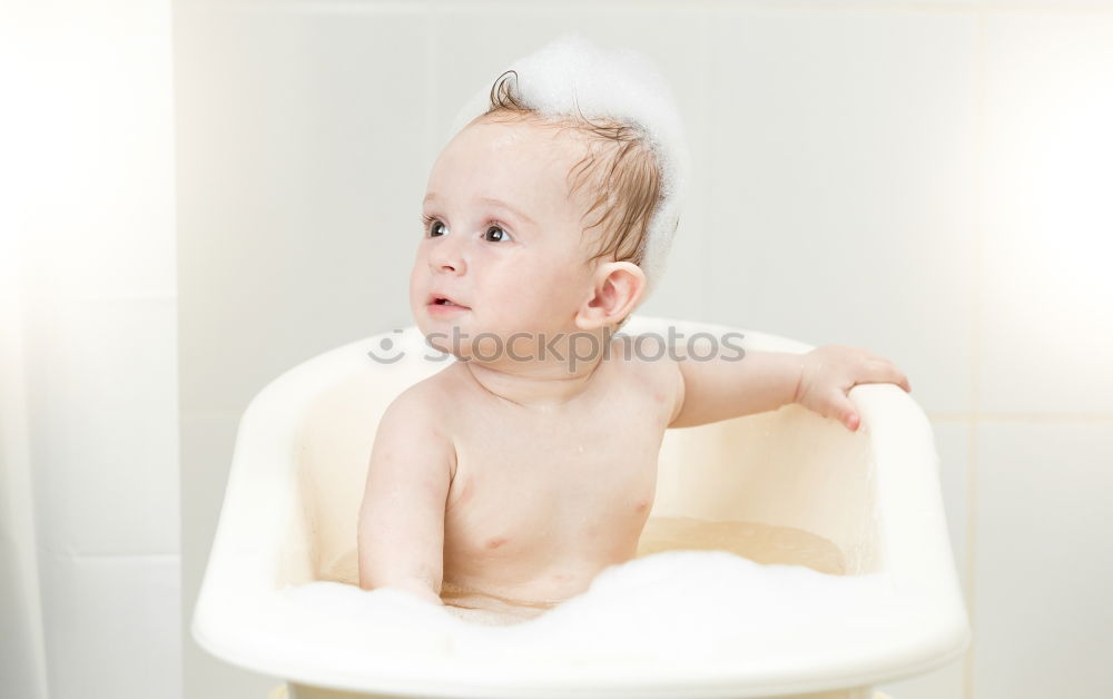 Similar – Image, Stock Photo Newborn taking bath