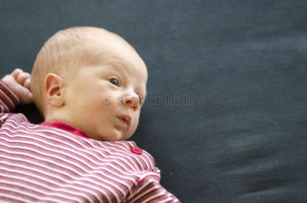 Similar – Image, Stock Photo Baby holding on to her mother’s shoulder