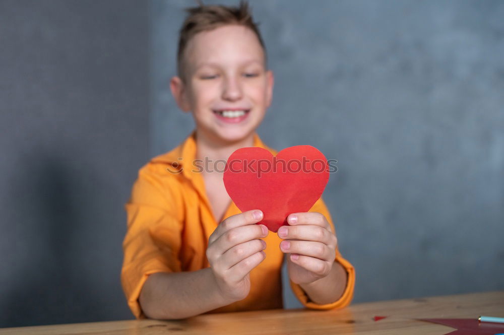 Similar – Image, Stock Photo Boy with chalk doesn’t want hate but love