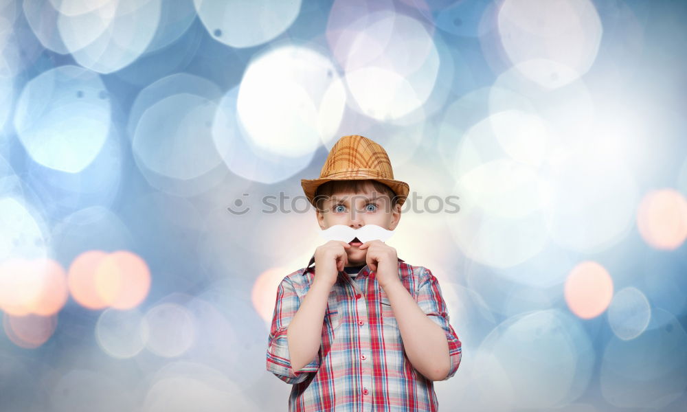 Similar – Sad boy sitting in a chair