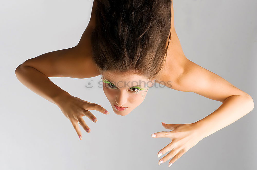 Young woman dancing in studio