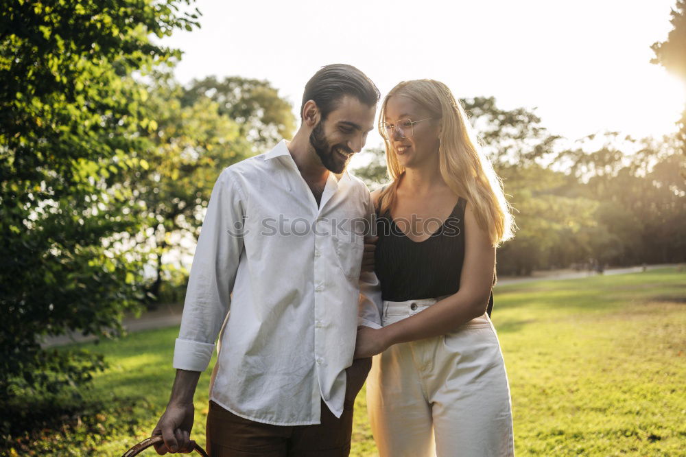 Similar – Couple standing at bus