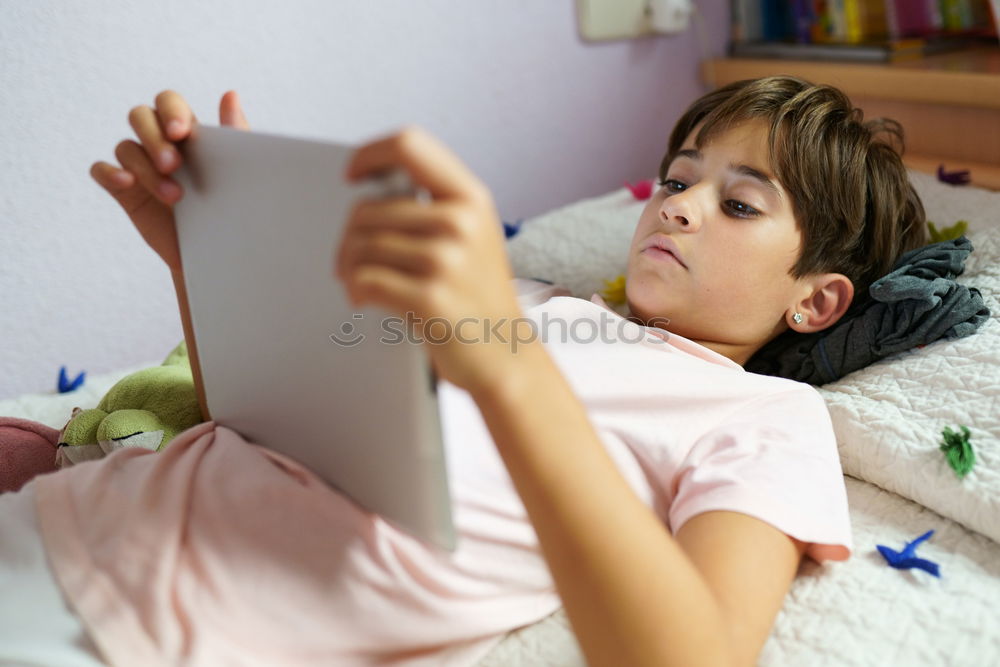 Similar – Image, Stock Photo Girl disguised as a butterfly reading with her doll